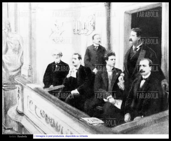 Nella foto: un'illustrazione raffigurante i compositori (da sin.) Giuseppe Verdi (Giuseppe Fortunino Francesco Verdi), Giacomo Puccini (Giacomo Antonio Domenico Michele Secondo Maria Puccini), Arrigo Boito, Pietro Mascagni, Ruggero Leoncavallo e Umberto Giordano (Umberto Menotti Maria Giordano) in un palco a teatro
@ArchiviFarabola [112173 A.I.]