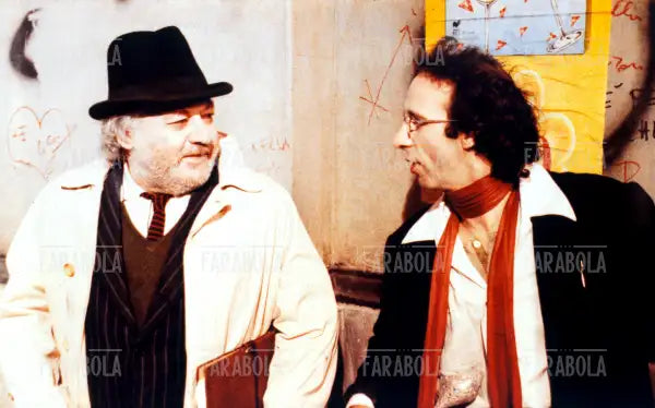 Paolo Villaggio e Roberto Benigni in una scena del film La voce della luna, 1990