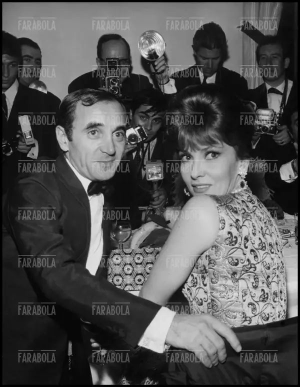 Charles Aznavour e Gina Lollobrigida, Parigi, 1965 - Farabola Immagine digitale
